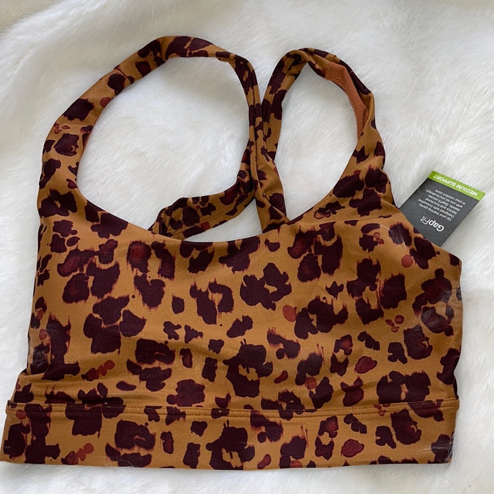 NWT- cheetah print cross cross sports bra